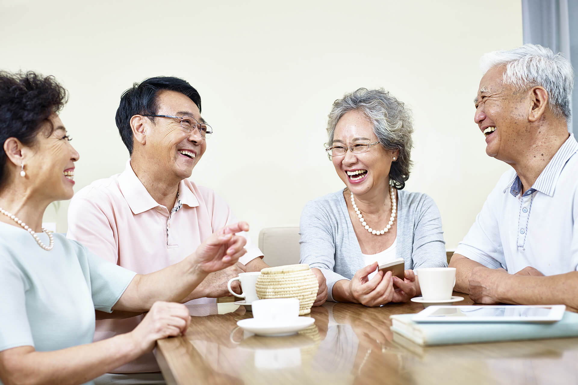 elderly people happily talking to each other