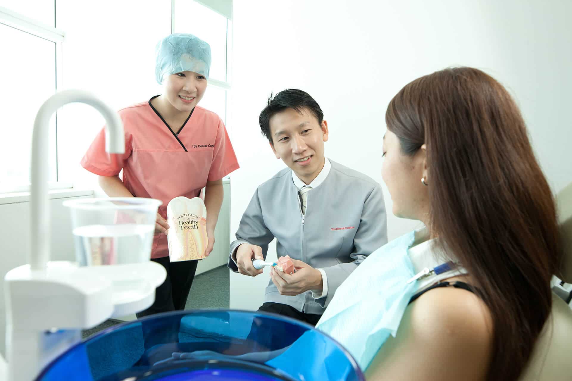 T32 Dental Staff explaining to their patient the dental procedure